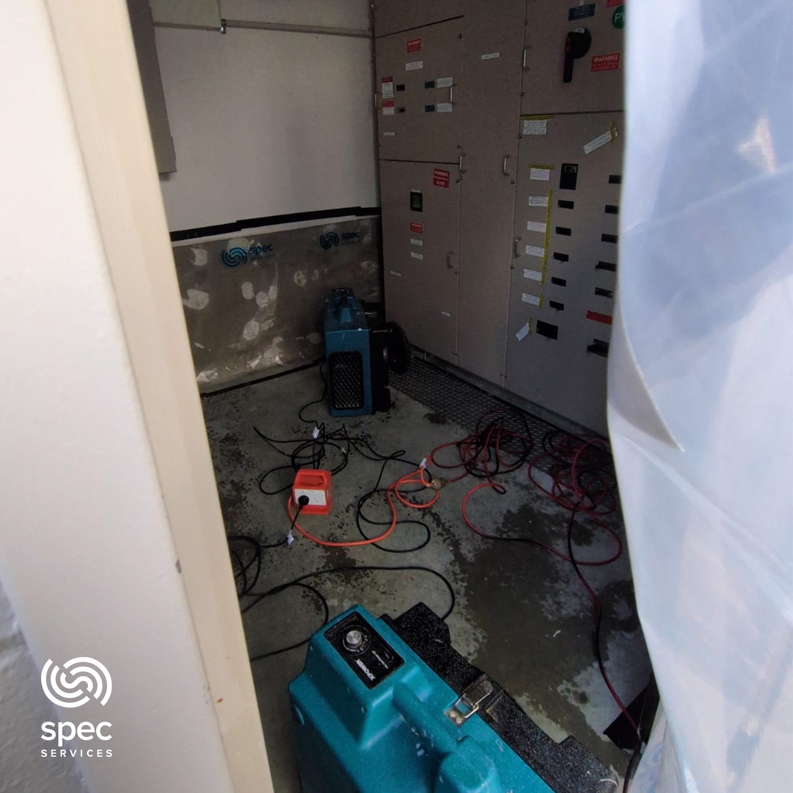 Flooded commercial interior requiring emergency water damage restoration