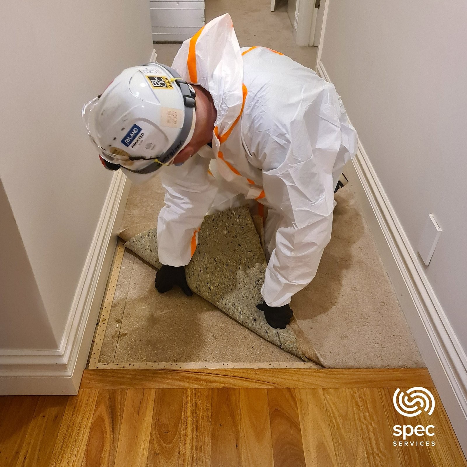 Removal of water-damaged flooring during restoration works